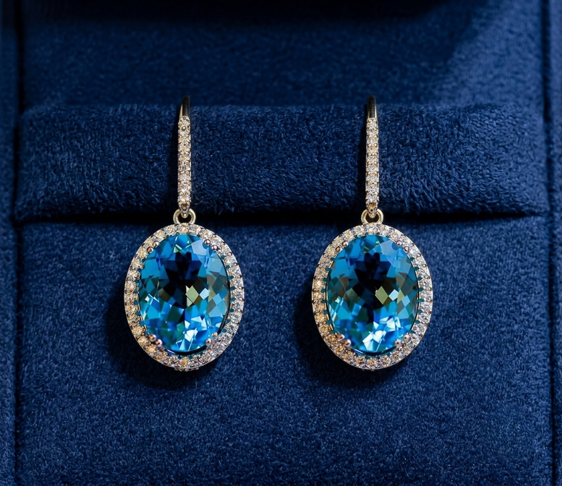 Earrings_on_blue_velvet_background.png